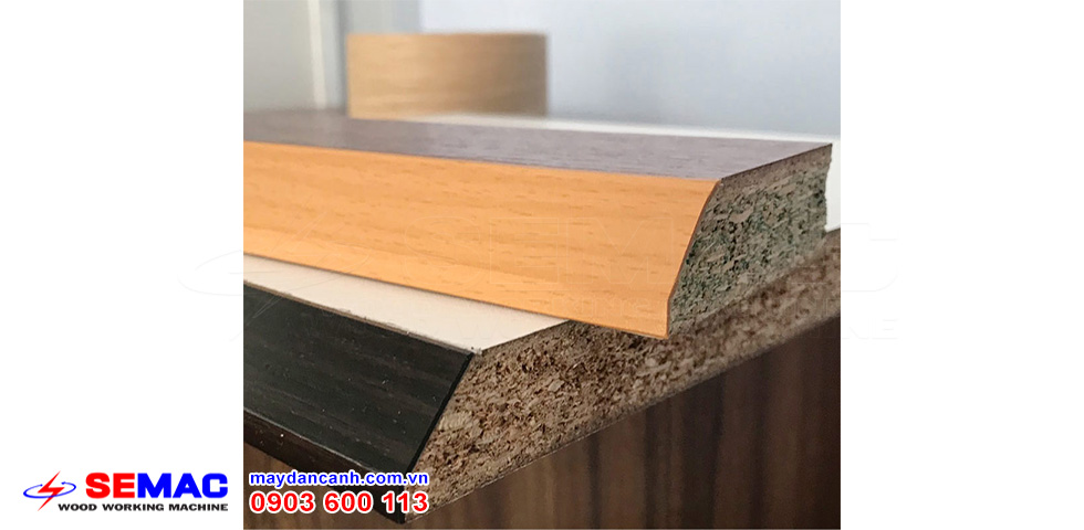 may-dan-canh-thang-nghieng-tai-nang Máy dán cạnh thẳng nghiêng tải nặng