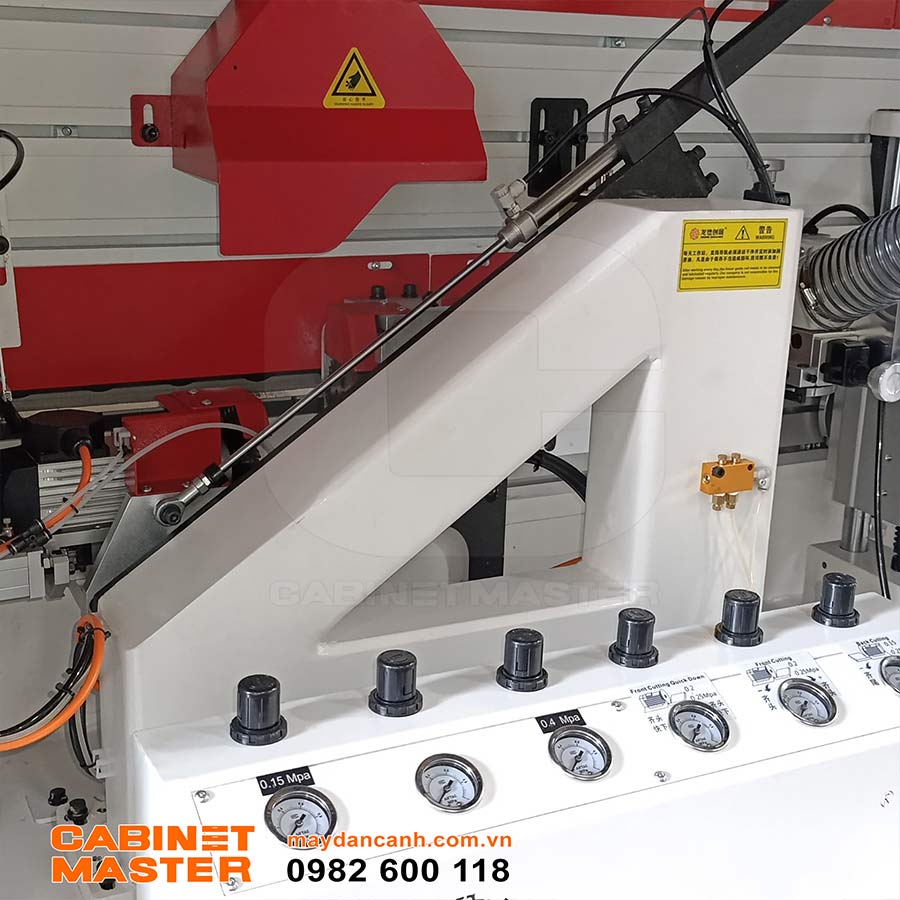 Cụm cắt đầu đuôi máy dán cạnh laser