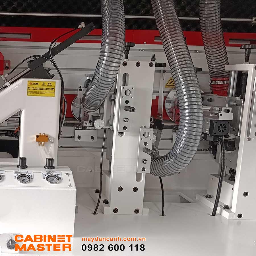 Cụm xén trên dưới máy dán cạnh laser