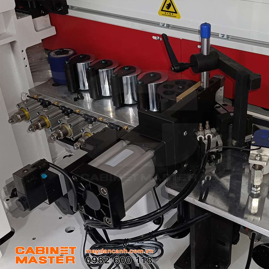Rulo ép nẹp máy dán chỉ cạnh laser